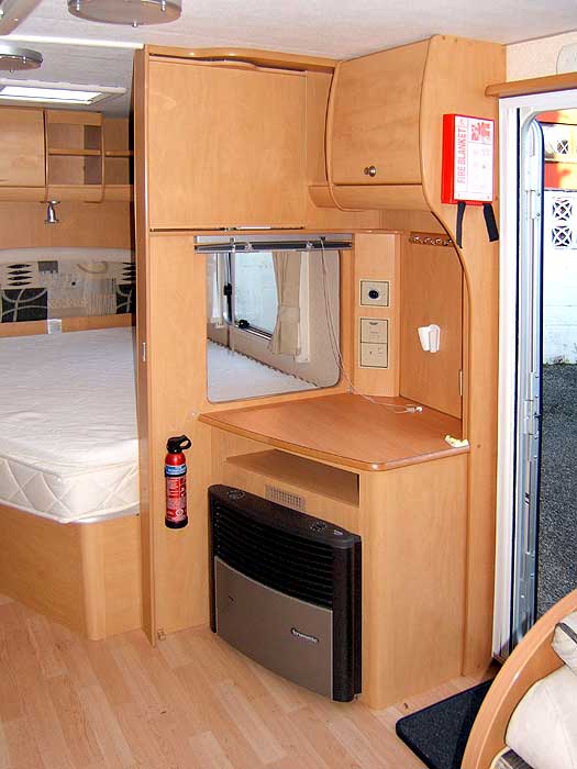 The TV station with aerial connection point, 12 volt and mains power sockets. The 'serving' hatch enables the TV to be viewed from the bedroom.